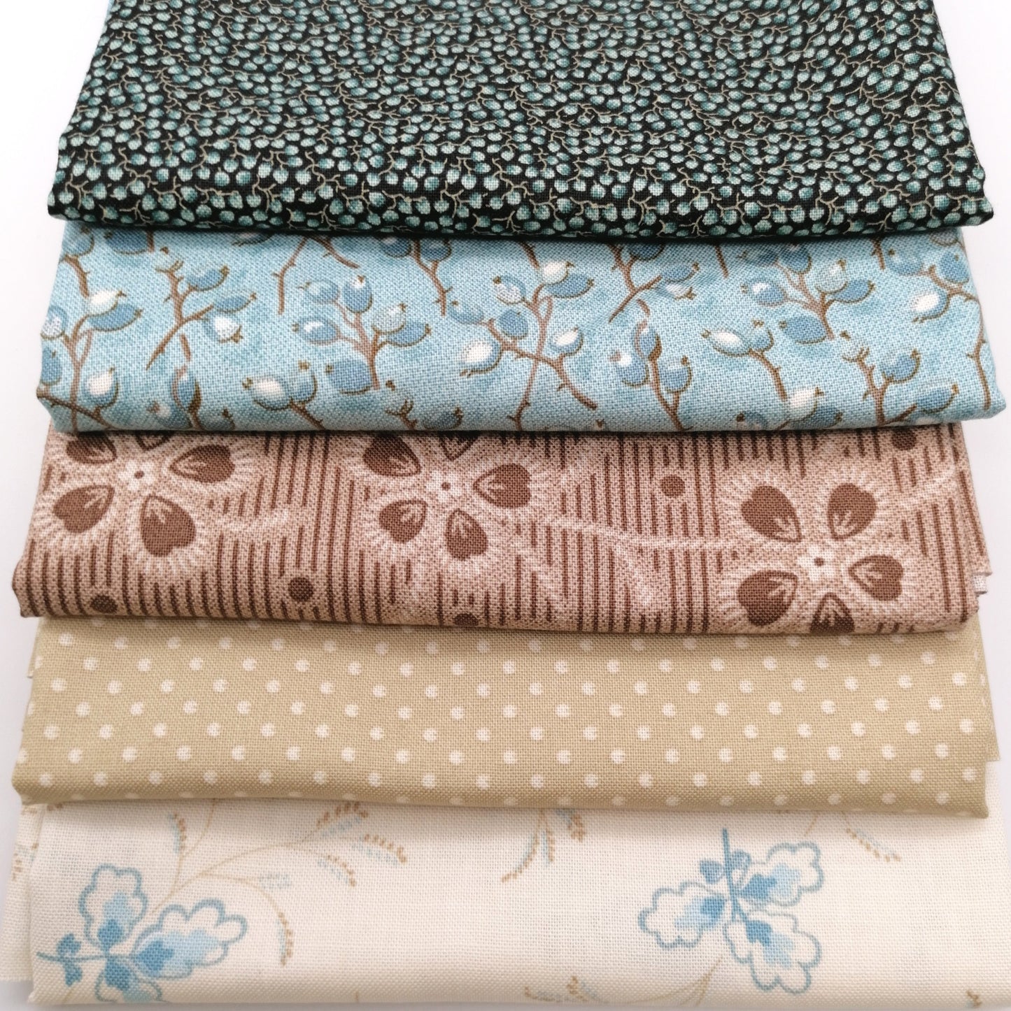 Fat Quarter Bundle LBQ16 - fanned flat lay of all 5 fat quarters from Laundry Basket Quilts for Andover Fabrics
