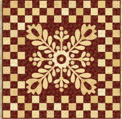 A square quilt or fabric panel featuring a central cream-colored snowflake motif over a dark red and cream checkerboard background.