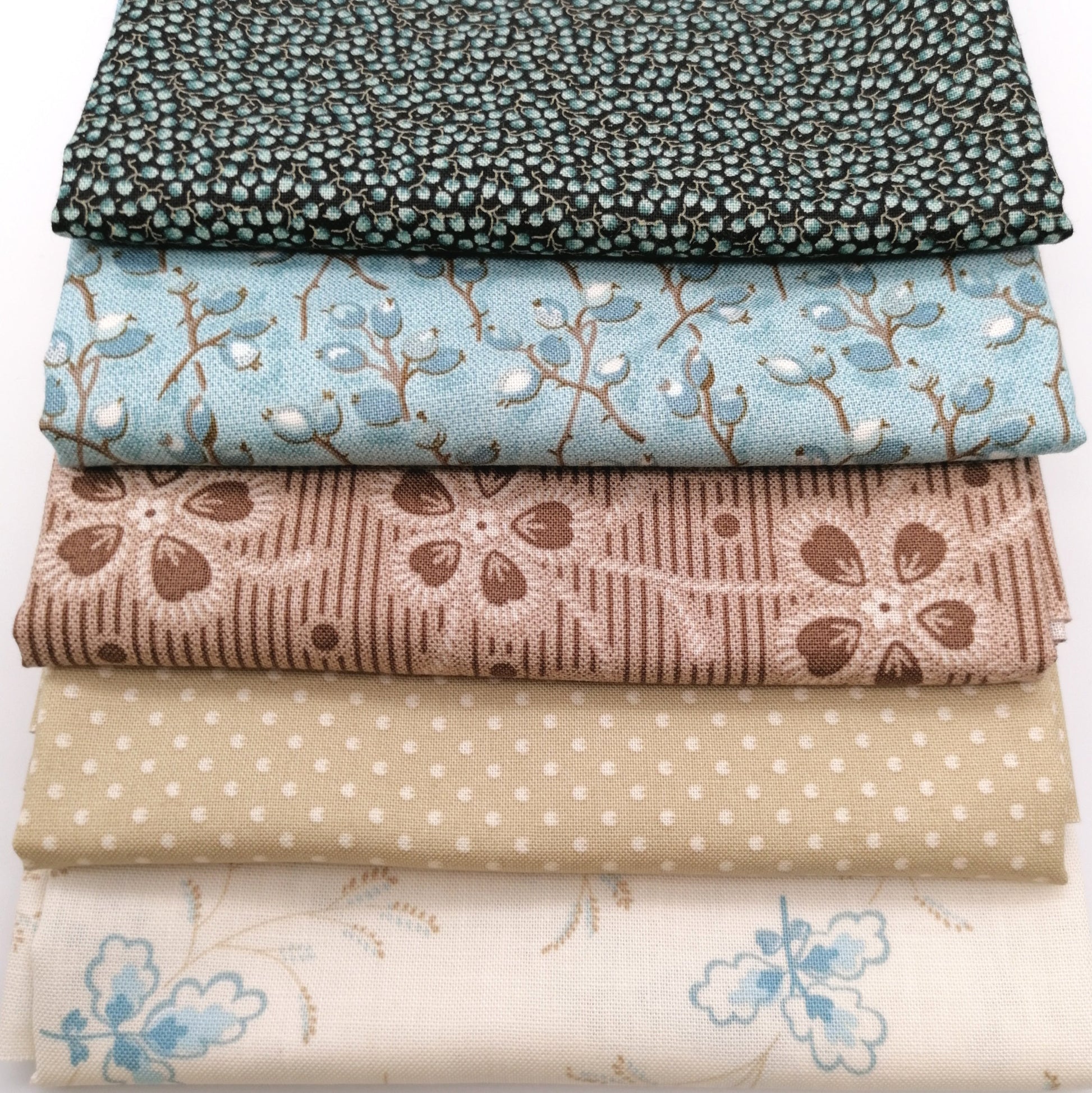 Fat Quarter Bundle LBQ16 - fanned flat lay of all 5 fat quarters from Laundry Basket Quilts for Andover Fabrics