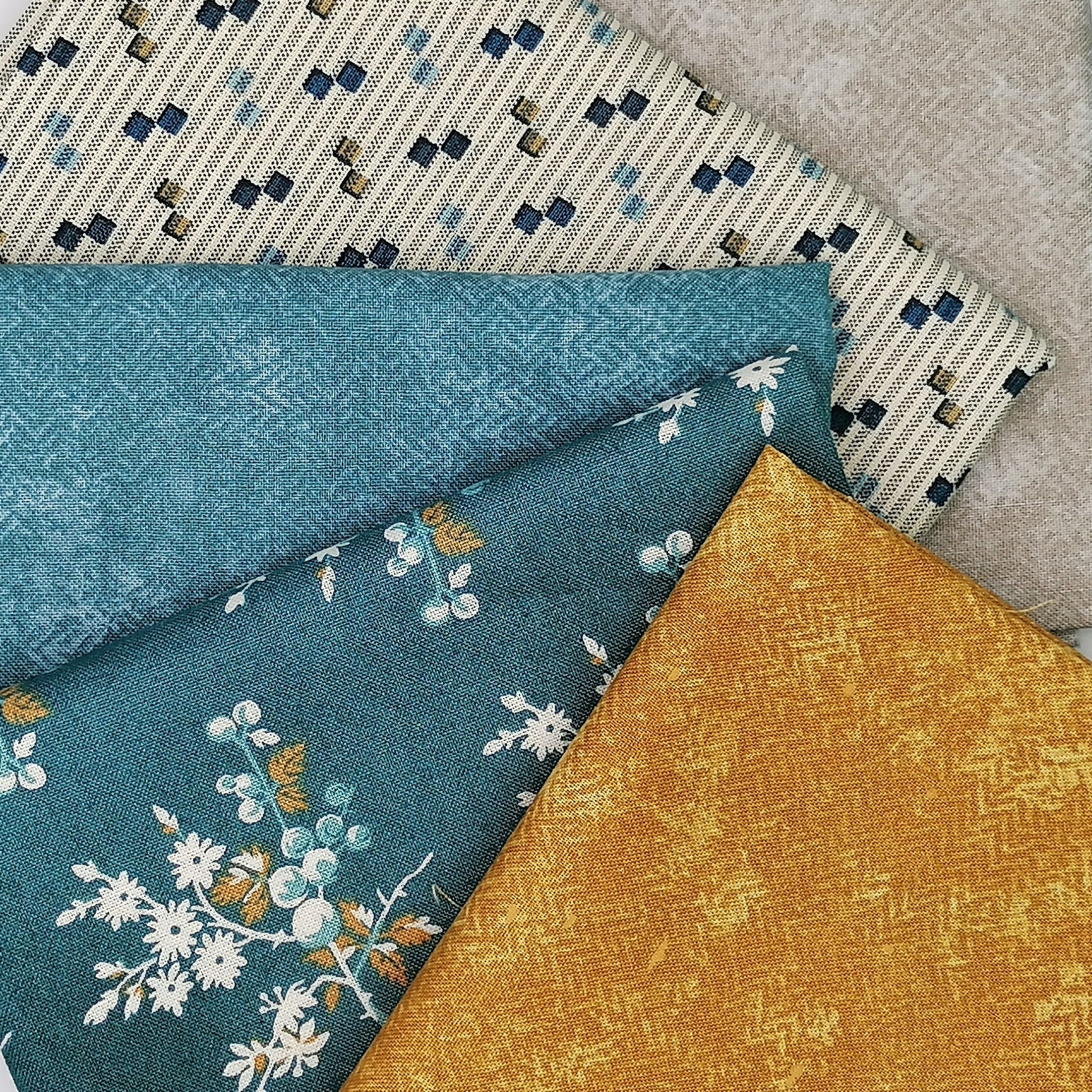 Fat Quarter Bundle LBQ17 - fanned flat lay showing teal floral, cream stripe, mustard gold and grey fat quarters
