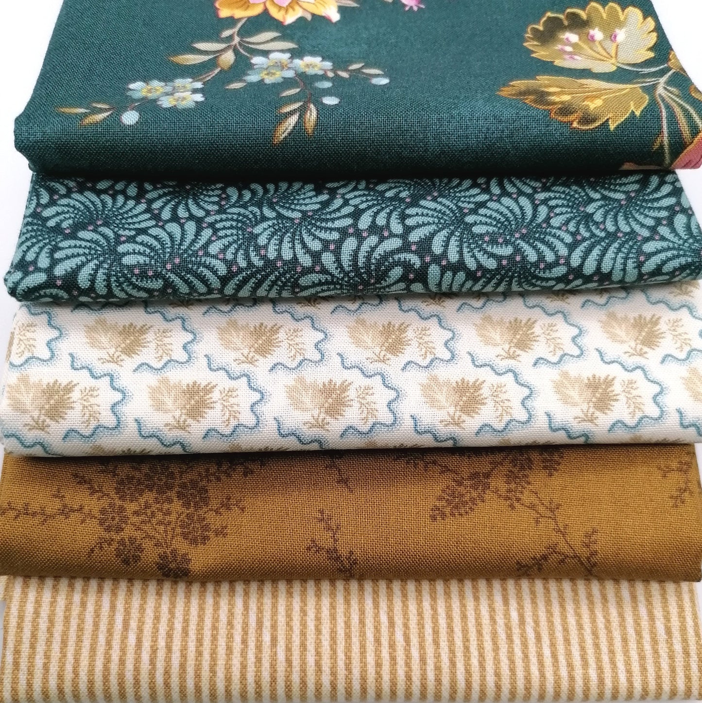 Fat Quarter Bundle LBQ18 - close up detail of forest green floral, teal paisley, cream botanical and mustard gold fat quarters