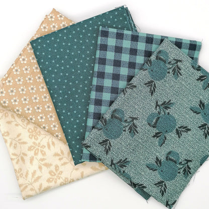 Fat Quarter Bundle LBQ19 - fanned flat lay showing teal botanical tonal, gingham plaid, star dot, sand floral and cream vine fat quarters from Laundry Basket Quilts for Andover Fabrics