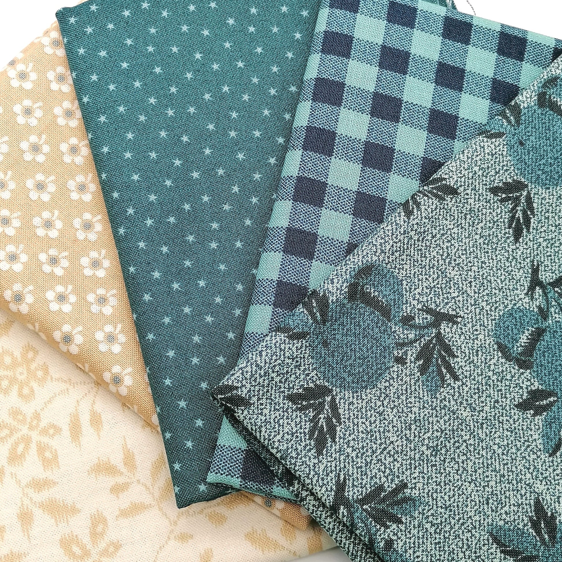 Fat Quarter Bundle LBQ19 - close up detail of teal gingham, star dot and botanical tonal fat quarters