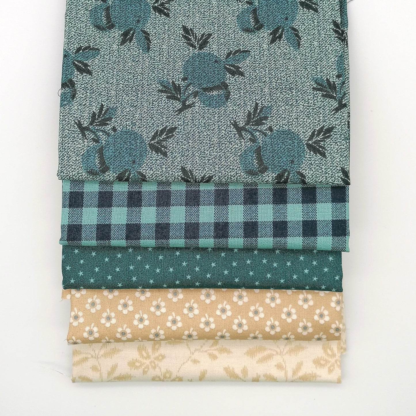Fat Quarter Bundle LBQ19 - stacked flat lay showing all 5 fat quarters including teal botanical, gingham, deep teal dot, sand floral and cream vine