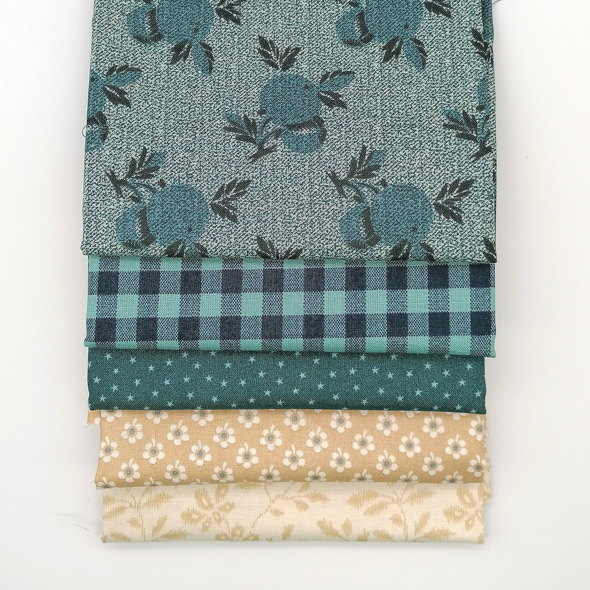 Fat Quarter Bundle LBQ19 - stacked flat lay showing all 5 fat quarters including teal botanical, gingham, deep teal dot, sand floral and cream vine