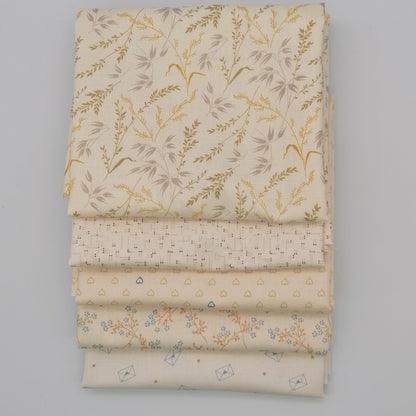 Fat Quarter Bundle LBQ21 - neatly stacked showing all 5 fat quarters including cream botanical, blush hearts, ditsy floral and envelope novelty prints