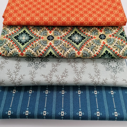 Fat Quarter Bundle LBQ25 - close up stack showing all 4 fat quarters including orange geometric circle print, cream tan medallion with teal green accents, pale grey ditsy floral vine, and dark navy stripe with small florals