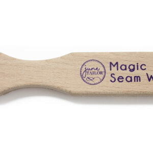 Magic Seam Wand – a wooden quilting tool for perfectly pressed, flat seams without burning fabric.