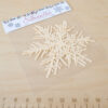 A package of 6 laser-cut snowflake fabric silhouettes in white, featuring 3 large and 3 small snowflakes, pre-fused and ready for quilting. Perfect for winter-themed projects like the Sleigh Trio Pattern